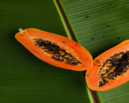Cut tropical fruits like papaya and banana